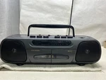 Boombox Gpx, Am/fm Stereo, Cassette Tape Player, In-ear Headphones, Ac/dc, Used. Fixed Price $29.00.