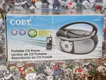 Coby CXCD275 Portable Player With Am/fm Stereo Box. Fixed Price $27.99.