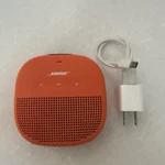 Bose Soundlink Micro Orange Portable Speaker. Excellent Condition. Fixed Price $60.00.