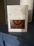 Wooden Bluetooth Speaker With Wireless Charging New. Fixed Price $40.00.