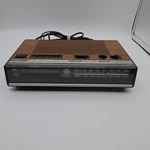 Vtg. General Electric Am/fm Alarm Clock Radio Model 7-4624B Wood Grain- Works. Fixed Price $27.50.