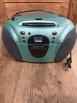 Vtg Teal Emerson PD6511G Cd, Cassette Player, RADIO;6 Ft Electric,battery;works. Fixed Price $44.00.