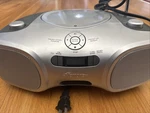 Memo, Rex, Portable Cd Player With Am/fm Stereo Radio And Power Supply. Fixed Price $35.00.