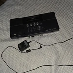 Velour YW-006 Cd Portable Player Radio Alarm. Fixed Price $69.00.