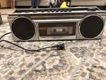 Sears 564.21802450 Am/fm Boombox Cassette Tape Auto Stop Silver Black Ac/dc. Fixed Price $20.00.