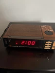 Vtg Candle 70 Fm/am Clock Radio Alarm Brown Black Works. Fixed Price $20.00.
