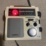 Et FR-300 Am/fm Weather Tv Radio With Light, Cell Phone Charger, Siren, Beige. Fixed Price $19.99.