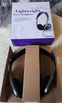 New Vintage Radioshack Lightweight Stereo Headphones 33-1116. Fixed Price $19.69.