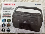 Toshiba Portable Bluetooth Speaker Black TY-ASC20 Output Power 20W 3.5MM Mic. Fixed Price $110.00.