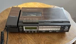 Vintage Magnavox D7529 Wood-tone Phone, Clock Radio, Cassette Player, Recorder. Fixed Price $57.00.