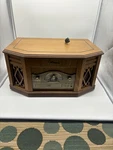 Emerson NR303TT 4-N-1 Player Cd, Cassette, Phono, Am/fm Radio Wood Case Works. Fixed Price $125.00.