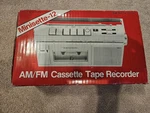 Vintage Realistic MINISETTE-12 Am/fm Radio Cassette Player 14-1012A. Fixed Price $45.99.