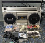 Quasar GX-3603 Boombox Cassette 2 Way 4 Speaker Radio W/ Chord & Tapes Works. Fixed Price $100.00.