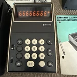 Sanyo Model ICC-802D Calculator Includes Case Power Supply Original Paperwork. Fixed Price $300.00.