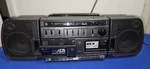 Am Fm Dual Cassette Stereo Hi Speed Dubbing Eq Boombox Model 3-5677B Works. Fixed Price $30.00.