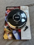 New In Package Jensen CD-60C 5.7" Portable Player With Bass Boost + Headphone. Fixed Price $25.00.