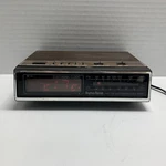 Vintage Dyna-tone Clock Radio Digital Am/fm Brown Woodgrain Model HK5/TCR-100. Fixed Price $24.99.