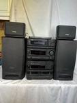 Aiwa Stereo System Model No. RX-N737U Double Cassette Tape, Radio,cd 4 Speakers. Fixed Price $200.00.
