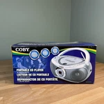 Coby Portable Player Radio Am/fm Silver Boombox 2009 Model CXCD237 New In. Fixed Price $49.99.