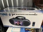 New - Naxa 7IN Bluetooth Dvd Boombox NDL256. Fixed Price $150.00.
